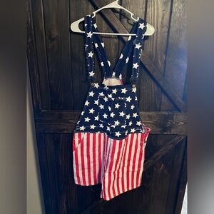 Stars and stripes overall shorts. Ladies size 2X fits like large.